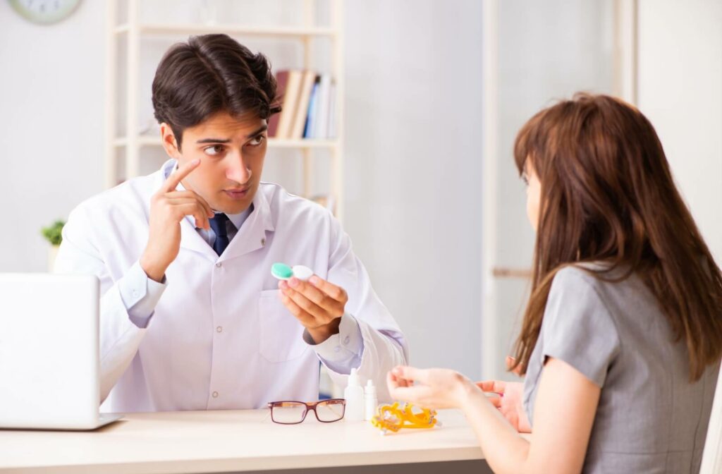 A patient discusses her contact needs with her eye doctor.